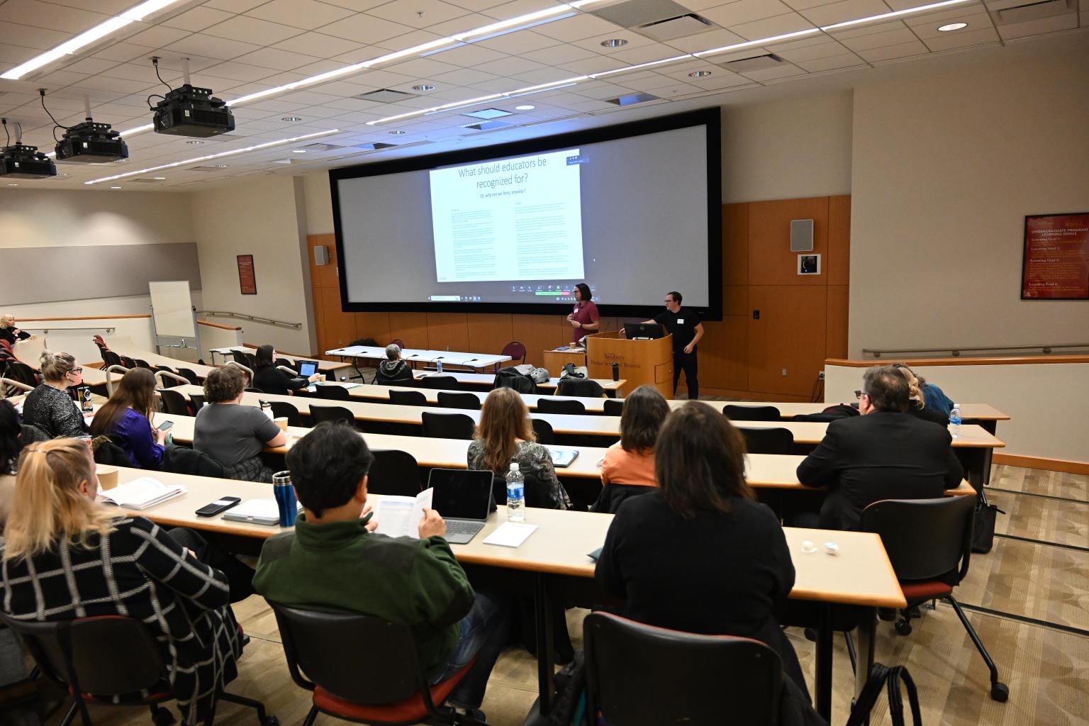 Attendees at TLC session in Perdue Hall 156 tiered classroom.