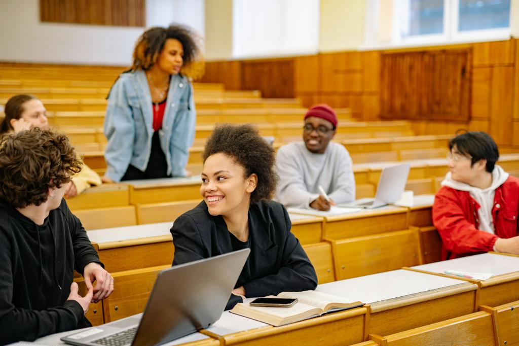 Group of six students in lecture hall