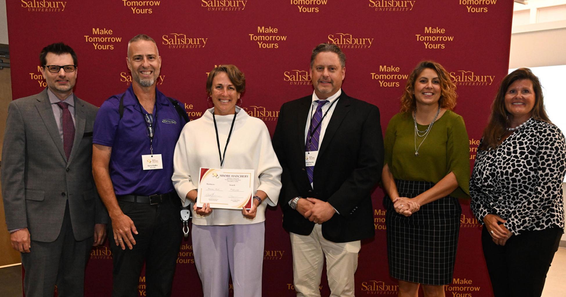 Pictured, from left: Michael Jensen, SU executive director of entrepreneurship; Darryl DuBre; Suzen DuBre; Steve Burke; Aurora Edenhart-Pepe, SU vice president of administration and finance; and Dr. Christy Weer, dean of SU's Franklin P. Perdue School of Business.